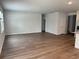 Spacious living room with wood floors, offering a blank canvas for personalization and decor at 945 Laconic Dr., Myrtle Beach, SC 29588