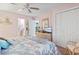 Comfortable bedroom with a dresser, a TV, closet space, and access to an ensuite bathroom at 9550 Dunes Gable Dr. # A, Myrtle Beach, SC 29572