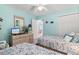 Bedroom features two twin beds, dresser, and closet space creating a functional space at 9550 Dunes Gable Dr. # A, Myrtle Beach, SC 29572