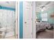 Hallway between bathroom and bedroom with coordinated wall colors and decor at 9550 Dunes Gable Dr. # A, Myrtle Beach, SC 29572
