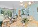 Cozy seating area featuring a view of screened-in porch with ceiling fan and light-blue walls at 9550 Dunes Gable Dr. # A, Myrtle Beach, SC 29572