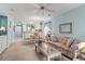 Open concept living area connects to the kitchen and features a ceiling fan at 9550 Dunes Gable Dr. # A, Myrtle Beach, SC 29572