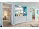 Hallway off the living room featuring a storage area, bar space, and lots of light at 9550 Dunes Gable Dr. # A, Myrtle Beach, SC 29572