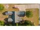 Aerial top-down view of the home showing the roof, driveway, and surrounding trees at 101 Alpharetta Ct., Conway, SC 29526