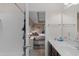 Bathroom with a white-tiled shower/tub and view into the cozy bedroom at 101 Alpharetta Ct., Conway, SC 29526
