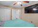 Bright bedroom features a closet, door, and mounted television, providing storage and entertainment at 101 Alpharetta Ct., Conway, SC 29526
