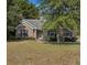 Beautiful brick home with a manicured lawn and tasteful landscaping, offering a warm and welcoming facade at 101 Alpharetta Ct., Conway, SC 29526
