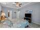 Calm bedroom with tray ceiling, gray walls, carpeted floors, and a TV at 101 Fulbourn Pl., Myrtle Beach, SC 29579
