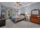 Serene bedroom with tray ceiling, neutral colors, and ample natural light at 101 Fulbourn Pl., Myrtle Beach, SC 29579
