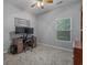 Neutral bedroom with a desk area, computer monitors, a ceiling fan, and a window at 101 Fulbourn Pl., Myrtle Beach, SC 29579