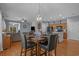 Open dining area with hardwood floors that flows into living room and kitchen at 101 Fulbourn Pl., Myrtle Beach, SC 29579