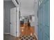Welcoming foyer with hardwood floors, leading to an open-concept living space at 101 Fulbourn Pl., Myrtle Beach, SC 29579