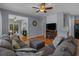Inviting living room with hardwood floors, plush sectional sofa, and stylish decor at 101 Fulbourn Pl., Myrtle Beach, SC 29579