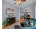 Cozy seating area with hardwood floors, stylish furnishings, and a view to other rooms at 101 Fulbourn Pl., Myrtle Beach, SC 29579