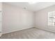 Bedroom with carpeting and a bright window allowing natural light into the space at 109 Old Chimney Ln, Conway, SC 29526