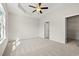 Spacious main bedroom features a tray ceiling, ceiling fan, and ensuite bathroom access at 109 Old Chimney Ln, Conway, SC 29526