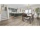 Spacious living area with open kitchen, dining area, and staircase at 1127 Harvester Circle # 1127, Myrtle Beach, SC 29579