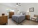 Cozy bedroom with wood floors, a ceiling fan, and comfortable furnishings at 1127 Harvester Circle # 1127, Myrtle Beach, SC 29579