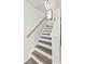 Bright staircase with wooden handrail and modern design at 1127 Harvester Circle # 1127, Myrtle Beach, SC 29579