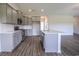 Spacious kitchen featuring ample cabinetry, stainless steel appliances, and a center island at 115 Old Chimney Ln, Conway, SC 29526