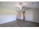 Large living room with vinyl plank flooring and a ceiling fan at 115 Old Chimney Ln, Conway, SC 29526