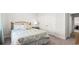 Bedroom featuring a comfortable bed, nightstand, neutral decor, and a double door closet at 1236 Barrington Way, Conway, SC 29526