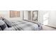 Bedroom featuring a comfortable bed, decor, and a full length mirror at 1236 Barrington Way, Conway, SC 29526