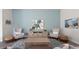 Chic living room showcasing a decorative console, modern art, and comfortable seating arrangements at 1236 Barrington Way, Conway, SC 29526