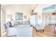 Cozy living room with modern decor, comfortable seating, and a view into the adjacent dining area at 124 Spartina Ct. # 30, Pawleys Island, SC 29585