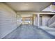 View through the covered parking area towards the water, offering a glimpse of the scenic surroundings at 124 Spartina Ct. # 30, Pawleys Island, SC 29585