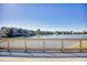 Stunning water view from a private deck, showcasing the tranquil lake and surrounding community at 124 Spartina Ct. # 30, Pawleys Island, SC 29585