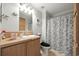 Bathroom with a shower-tub combo, neutral walls, and vanity with countertop space at 133 Lakeside Crossing Dr., Conway, SC 29526