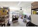 Spacious garage featuring a golf cart, storage, and overhead lighting at 133 Lakeside Crossing Dr., Conway, SC 29526