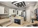 Well-lit kitchen with stainless steel appliances, custom cabinets, and an island at 133 Lakeside Crossing Dr., Conway, SC 29526