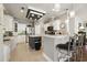 Spacious kitchen with stainless steel appliances, tile flooring, and island at 133 Lakeside Crossing Dr., Conway, SC 29526