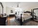 Comfortable main bedroom with a large bed, bay window, and wood floors at 133 Lakeside Crossing Dr., Conway, SC 29526