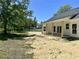 Covered back patio with columns and multiple access points offering an ideal space for outdoor living at 133 Thrush Ct., Georgetown, SC 29440