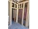 View of interior wood framing showing the doorway to another room in unfinished home at 133 Thrush Ct., Georgetown, SC 29440
