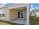 Cozy covered patio with sliding glass doors, perfect for outdoor relaxation at 1406 Nokota Dr., Conway, SC 29526