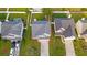 Aerial view of a home with a fenced-in backyard, pool and playground at 1439 Brighton Ave., Myrtle Beach, SC 29588