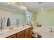 Bathroom features a double vanity and a soaking tub at 1439 Brighton Ave., Myrtle Beach, SC 29588