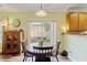 Cozy dining area features a sliding glass door that provides natural light and access to the outdoor space at 1439 Brighton Ave., Myrtle Beach, SC 29588