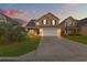 Beautiful two-story home with a well-manicured lawn and a long driveway, showcasing curb appeal at 1439 Brighton Ave., Myrtle Beach, SC 29588