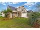 Charming two-story home with manicured lawn, mature landscaping, and a welcoming front porch at 1439 Brighton Ave., Myrtle Beach, SC 29588