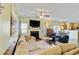 Open living area with comfortable seating, a fireplace, and access to the kitchen at 1439 Brighton Ave., Myrtle Beach, SC 29588