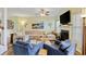 Cozy living room with a fireplace, a large sectional sofa, and stylish decor at 1439 Brighton Ave., Myrtle Beach, SC 29588