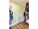 Spacious walk-in closet with wood flooring and access door for storage at 1439 Brighton Ave., Myrtle Beach, SC 29588