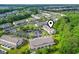 An aerial view of a townhome community, highlighting its prime location and amenities at 157 Olde Towne Way # 4, Myrtle Beach, SC 29588