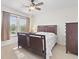 Bright bedroom featuring a ceiling fan, plush carpeting, and natural lighting at 157 Olde Towne Way # 4, Myrtle Beach, SC 29588