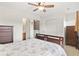 Well-lit bedroom featuring two dressers and a doorway leading to the bathroom at 157 Olde Towne Way # 4, Myrtle Beach, SC 29588